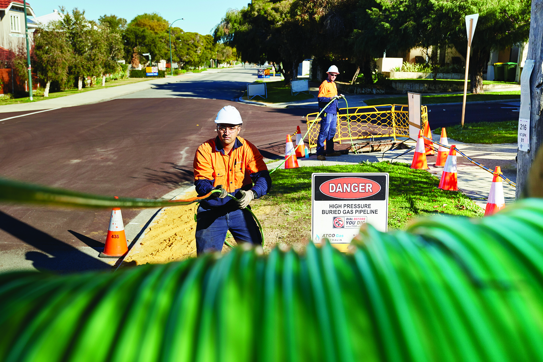 men installing nbn cables